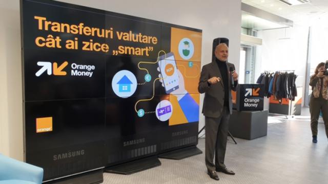 <b>[UPDATE: Detalii curs valutar] Utilizatorii Orange Money pot realiza de astăzi transferuri valutare în aplicația mobilă, cu 0 comision</b>În cadrul unui eveniment ce a avut loc în această dimineață și la care am luat parte, Orange România a anunțat un nou serviciu parte din platforma Orange Money. Anunțul a avut loc în cadrul Orange Business