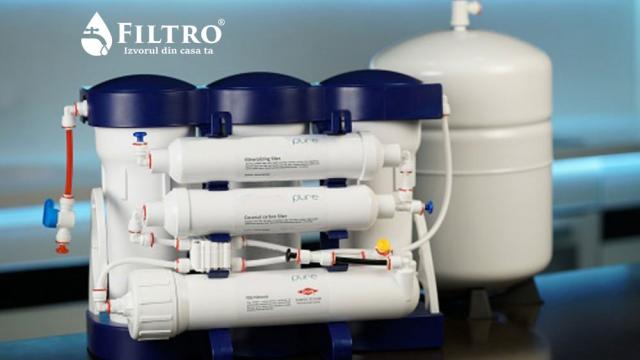 <b>(P) Economiseste bani cu un purificator de apă prin osmoză inversă (reducere de 27%) - FILTRO.ro</b>Sistemul cu osmoza inversa FILTRO PURE 6M este un sistem premium, compact, creat pentru a va oferi o apa pura direct in casa sau apartamentul dvs. De asemenea, acest sistem complet pentru filtrarea apei se poate folosi si in cabinetele medicale sau in..
